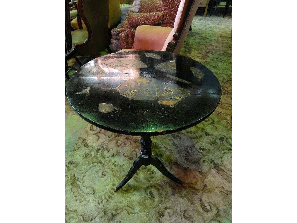 Appraisal: A black lacquered tilt top occasional table of circular form