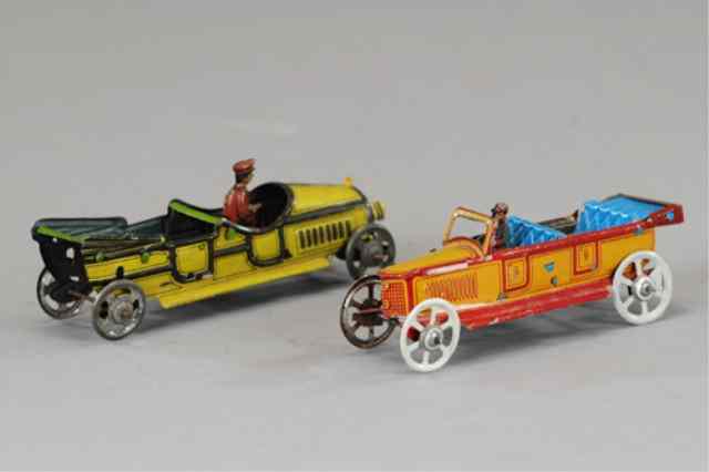 Appraisal: TWO LIMO PENNY TOYS Smaller auto by G Fischer featuring