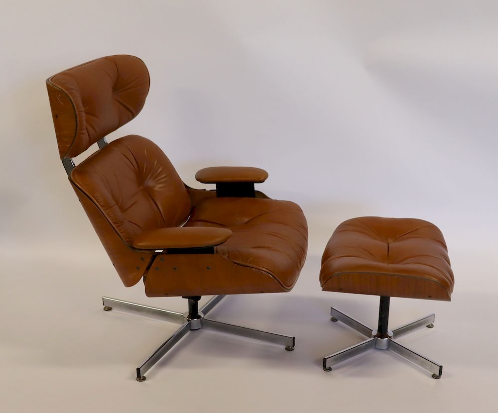 Appraisal: MIDCENTURY Eames Style Leather Upholstered Lounge Chair And Ottoman From