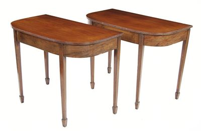 Appraisal: A pair of mahogany console tables each with a 'D'