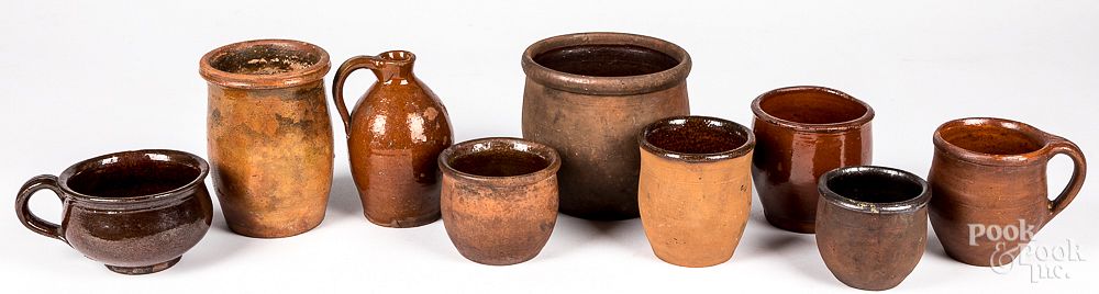 Appraisal: Nine pieces of Pennsylvania redware th c Nine pieces of