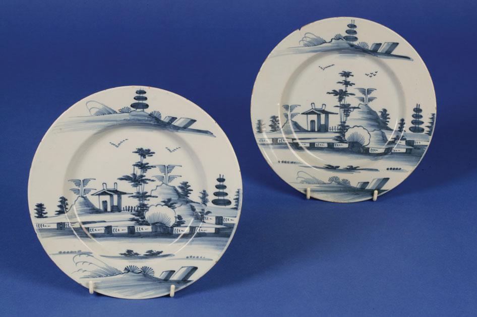 Appraisal: A PAIR OF DELFT BLUE AND WHITE PLATES th century