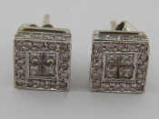 Appraisal: A pair of Art Deco carat white gold and diamond