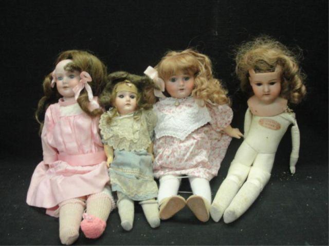 Appraisal: Four Porcelain Head Dolls A M Baby Betty Armand Marseille