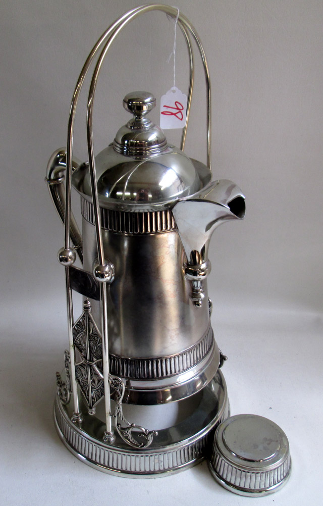 Appraisal: PAIRPOINT SILVER PLATED TILTING WATER PITCHER on stand Height inches