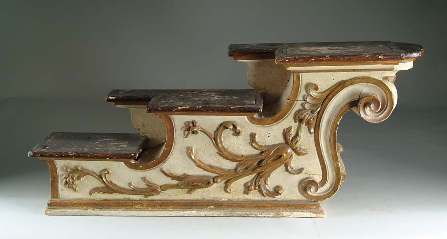 Appraisal: CAROUSEL ARCHITECTURAL PIECE Classic scroll-carved carousel piece possibly steps to