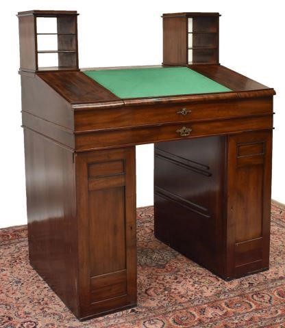 Appraisal: Unusual mahogany writing clerk's desk th c with open shelves