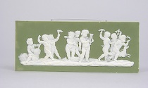 Appraisal: A Wedgwood Green Dip Plaque ca Oblong plaque with putti