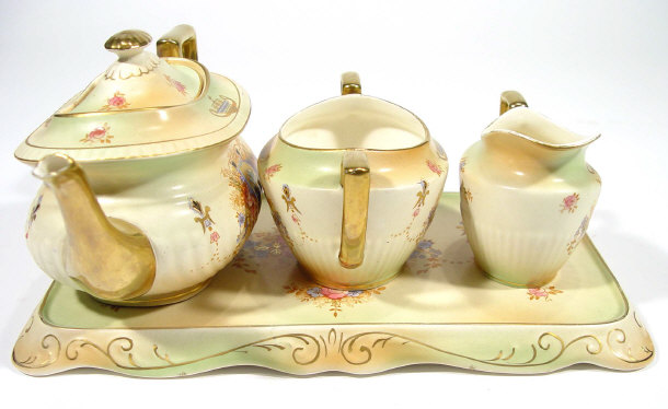 Appraisal: Edwardian Crown Devon three piece teaset on tray each piece