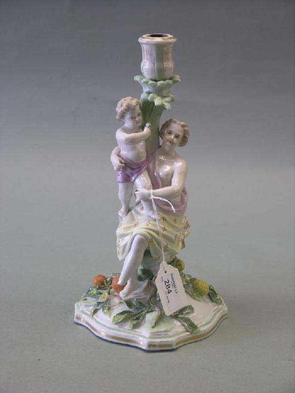 Appraisal: A th century Sitzendorf porcelain figural candlestick seated mother and