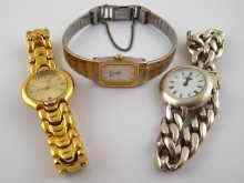 Appraisal: A silver lady's watch with integral bracelet by Quinn together