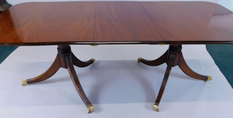 Appraisal: A mahogany extending D end dining table in Regency style