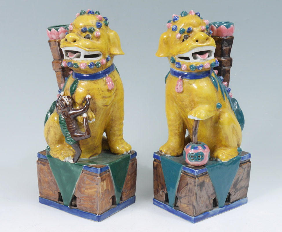 Appraisal: PAIR YELLOW GLAZE FOO DOGS Male with ball and female