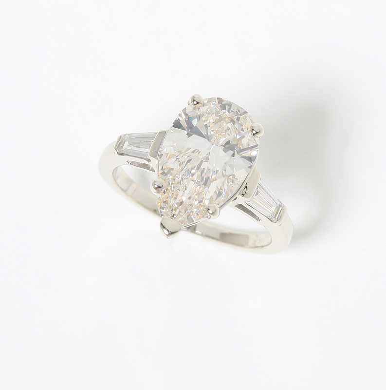 Appraisal: Platinum set with a pear-shaped diamond measuring x x mm