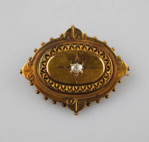 Appraisal: Victorian oval gold brooch with pierced and bead work decoration