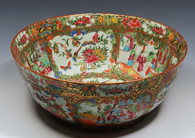 Appraisal: A CHINESE CANTON LARGE PUNCH BOWL with panels of figures