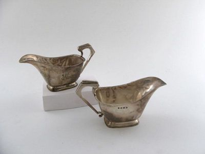 Appraisal: A pair of silver sauce boats in the Art Deco