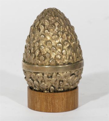 Appraisal: A Stuart Devlin silver-gilt and enamelled surprise egg textured form