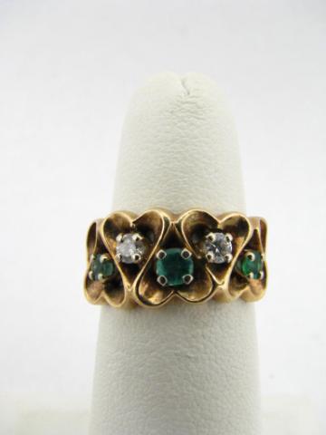 Appraisal: K yellow gold ring in heart design with three round