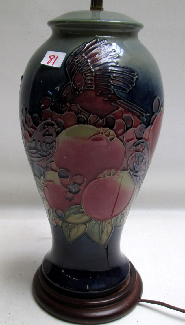 Appraisal: MOORCROFT POTTERY BALUSTER FORM LAMP hand painted under glaze in