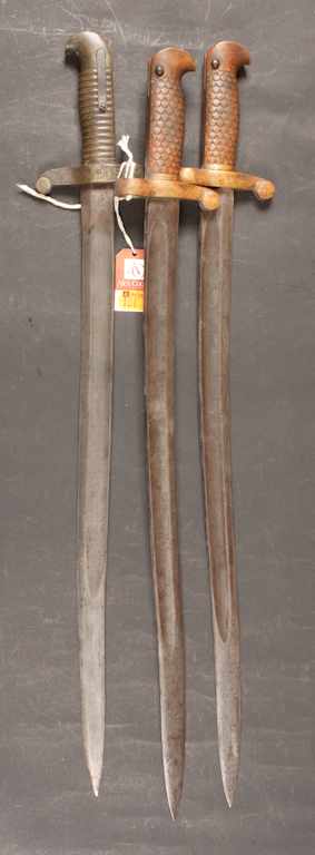 Appraisal: Three bayonets two possibly Winchester Model both marked with '''W''