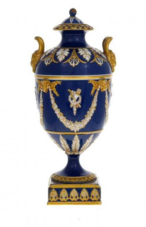 Appraisal: A WEDGWOOD VICTORIA WARE VASE AND COVER covered in deep