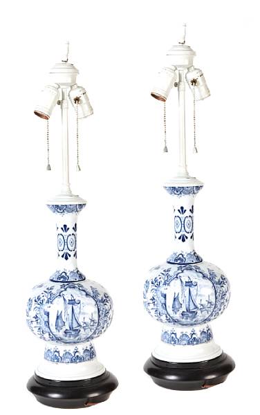 Appraisal: A pair of Delft blue and white vases as lamps