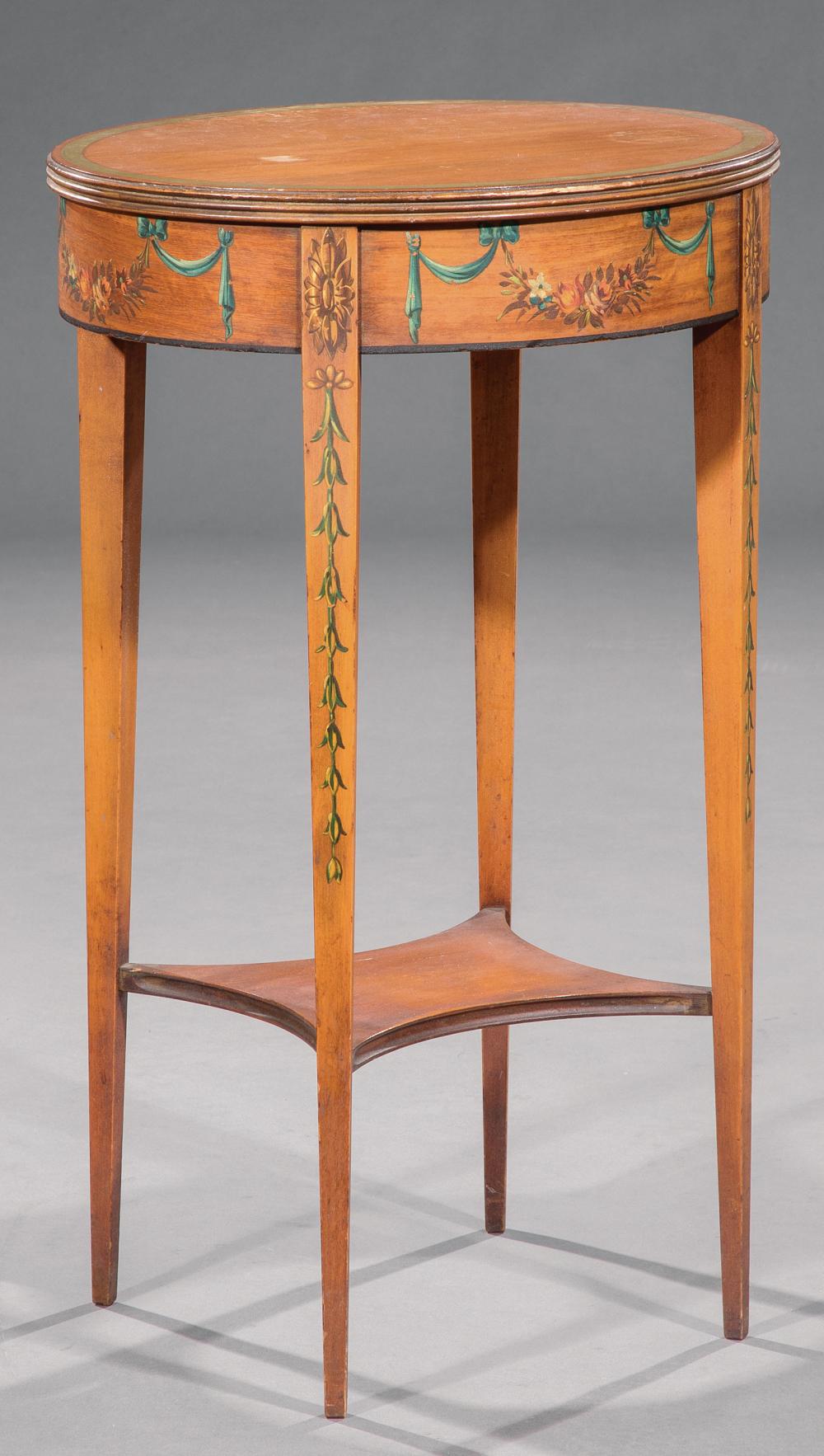 Appraisal: Adam-Style Painted Satinwood Occasional Table oval top conforming frieze tapered