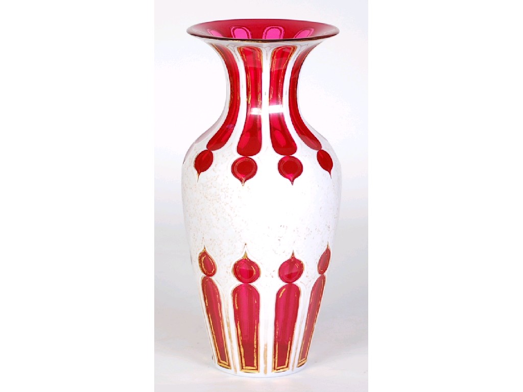 Appraisal: BOHEMIAN CRANBERRY AND WHITE OVERLAY TALL GLASS VASE of shouldered