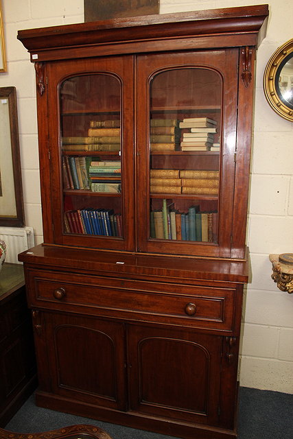 Appraisal: A VICTORIAN MAHOGANY SECRETAIRE BOOKCASE the three adjustable shelves behind