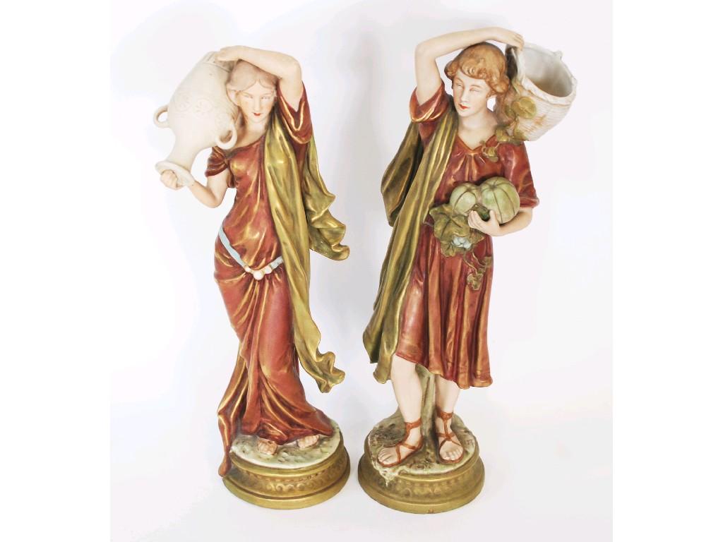 Appraisal: PAIR OF ROYAL DUX PORCELAIN FIGURES printed in muted tones