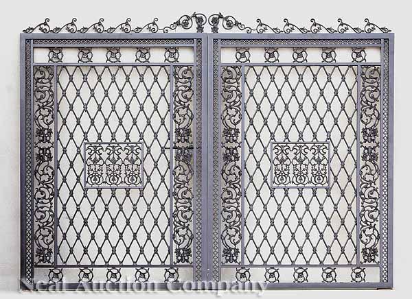 Appraisal: A Pair of Ornamental Cast Iron Estate Gates scrolled foliate