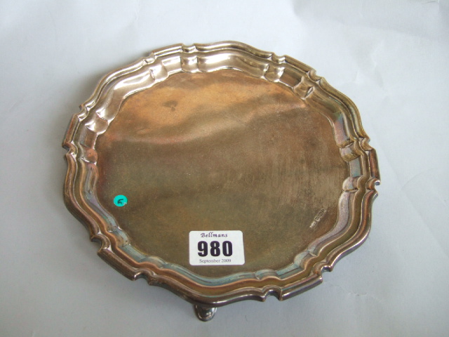 Appraisal: A silver shaped circular salver with a pie crust rim