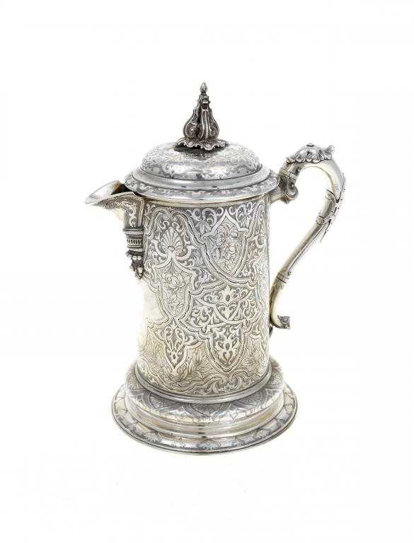 Appraisal: A SCOTTISH VICTORIAN FLAGON with domed lid quadripartite finial and