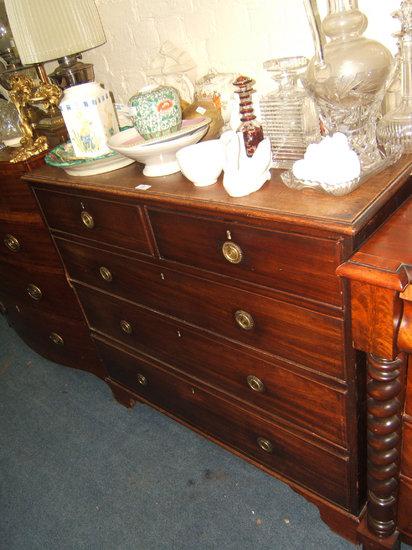 Appraisal: A George III mahogany straight front chest of two short