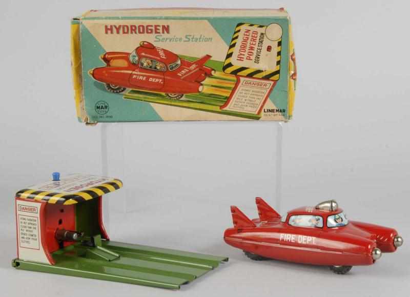 Appraisal: Tin Hydrogen Fire Dept Car Service Station Toy Description Japanese