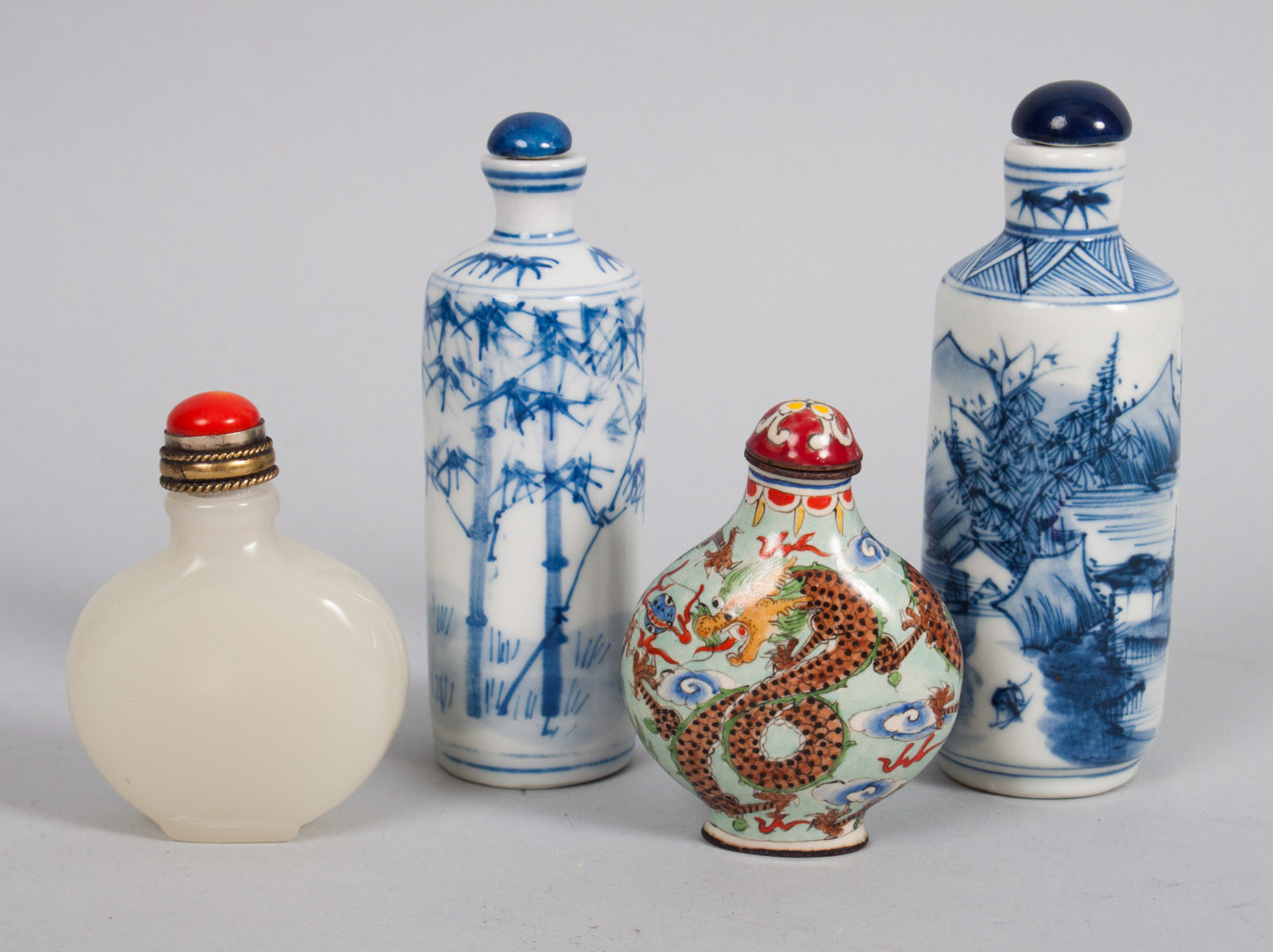 Appraisal: Four Chinese snuff bottles two blue and white porcelain with