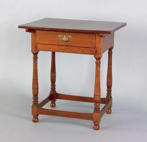 Appraisal: Pennsylvania diminutive walnut tavern table th c the plain top