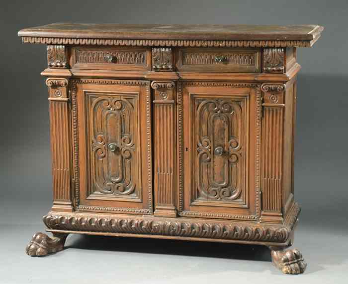 Appraisal: AN ITALIAN RENAISSANCE WALNUT SIDE CABINET late th early th