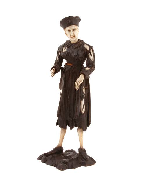 Appraisal: An Austrian carved wood and ivory figure height in