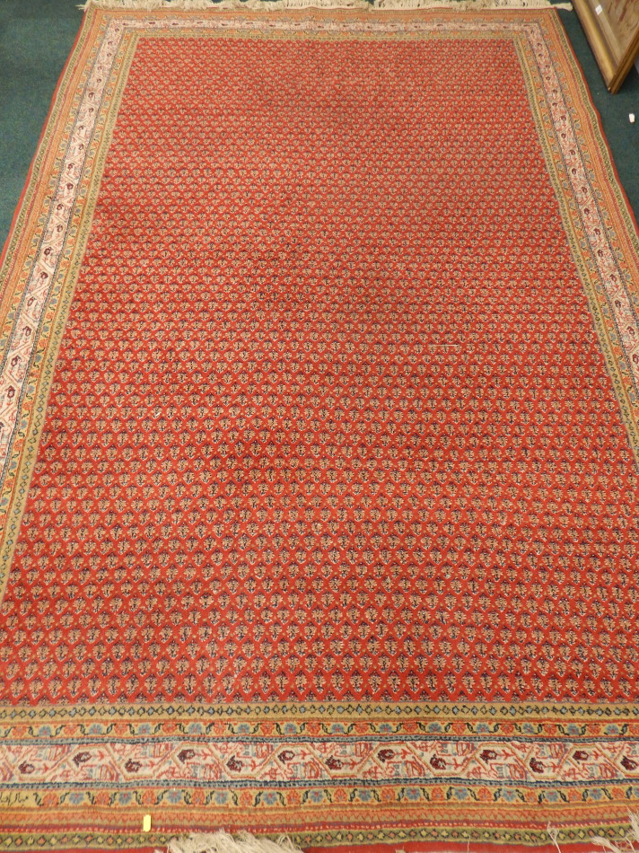 Appraisal: A machine woven Persian style Indian rug with a design