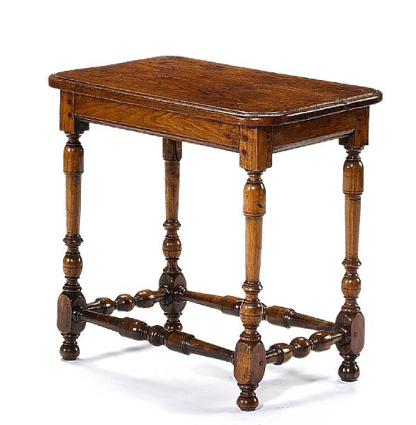 Appraisal: A Louis XIV elmwood console table The rectangular top with