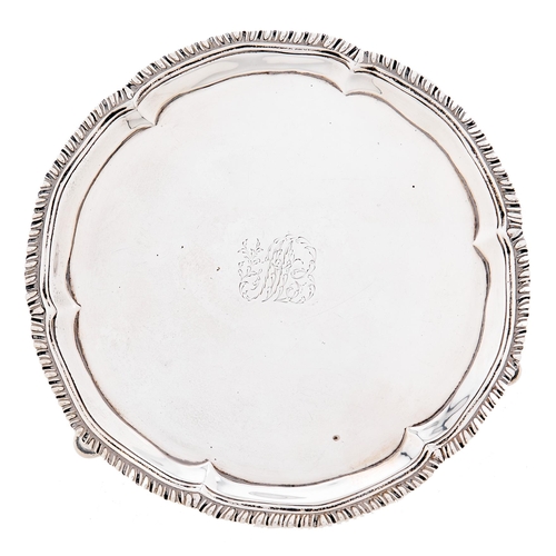 Appraisal: A George III silver waiter with gadrooned rim hoof feet