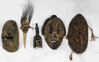 Appraisal: Papua New Guinea and African masks lot of Papua New