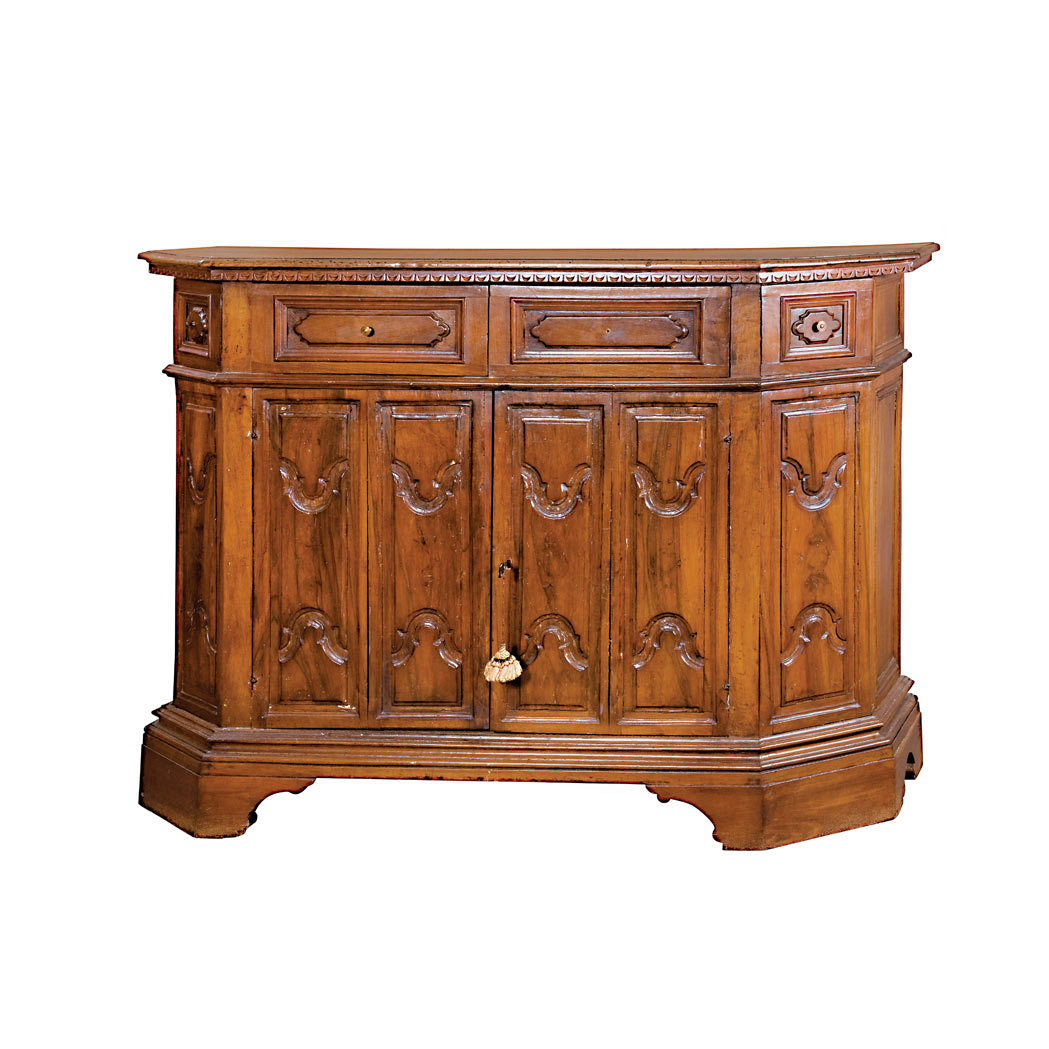 Appraisal: Italian Baroque Style Walnut Side Cabinet The canted rectangular top