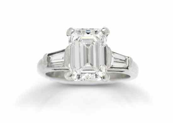 Appraisal: A Platinum and Diamond Ring containing one octagonal step cut