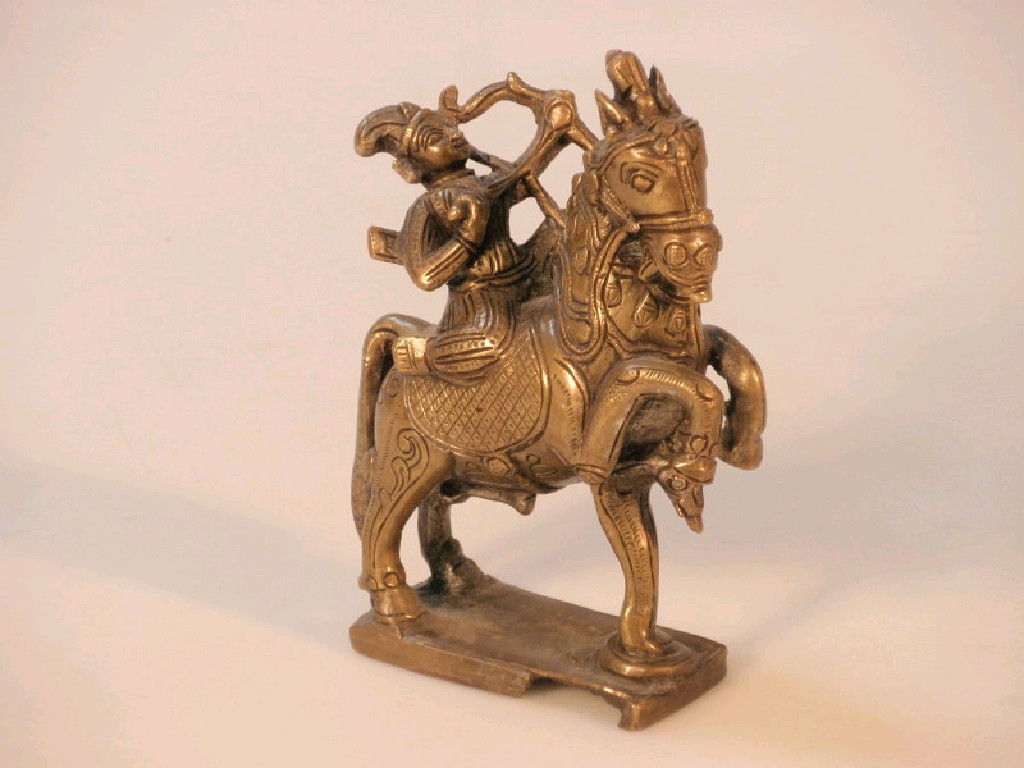 Appraisal: An Indian bronze figure of an archer on horseback cm