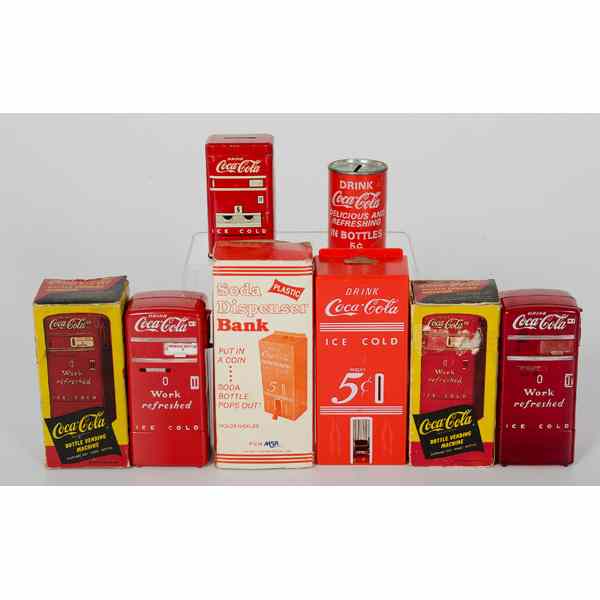 Appraisal: Lot of Coca-Cola Banks Lot of includes a cylindrical tinDrink