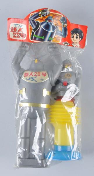 Appraisal: Lot Of Gigantor Japanese Superhero Figures Both plastic figures are