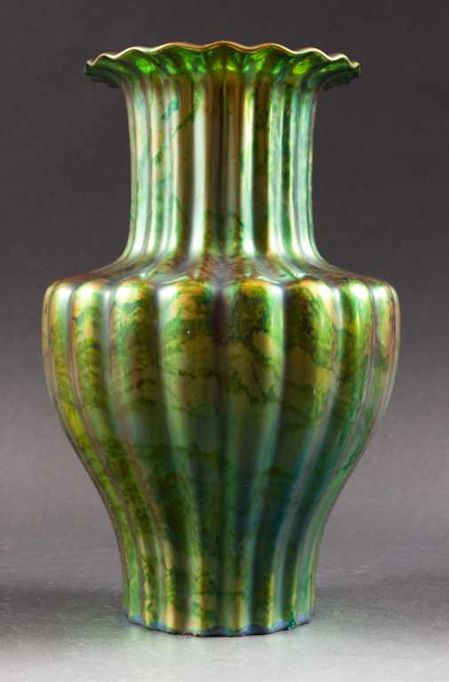 Appraisal: Zsolnay green iridescent glaze ceramic rib-form vase early th century